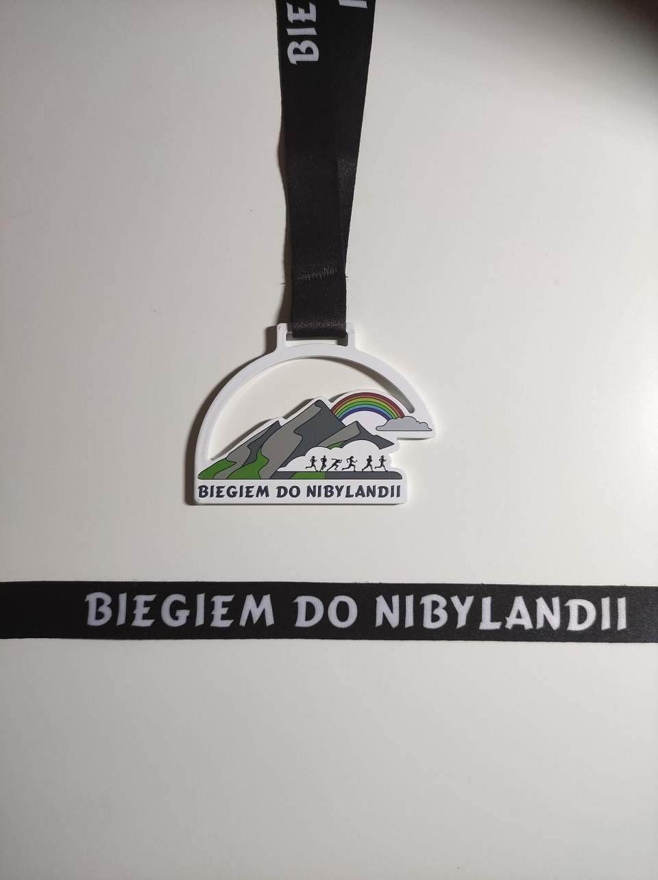 Medal biegu charytatywnego Biegiem do Nibylandii