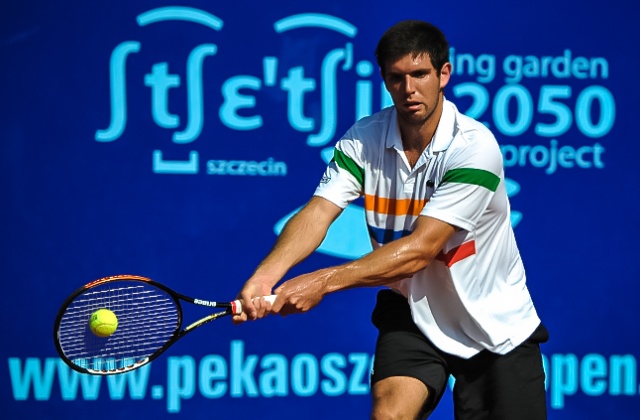 Federico Delbonis (ARG - biały) kontra Nicolas Devilder (FRA - czerwony). Fot. Łukasz Szełemej [PR Szczecin] Pierwszy Polak odpada z Pekao Open [ZDJĘCIA]
