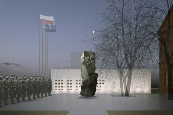 Trzymetrowa rzeźba z brązu oraz tablica z wyrytymi nazwiskami poległych stanie przed Centrum Żołnierza-Weterana Misji Zagranicznych w Warszawie.