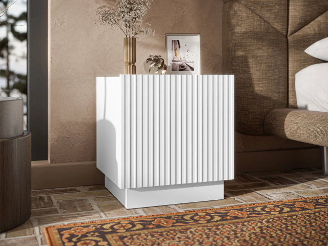 Szafka nocna to jeden z tych mebli, które łączy w sobie piękno i praktyczne walory użytkowe, stając się nieodłącznym elementem każdej sypialni. Niezależnie od tego, czy preferujesz klasyczne rozwiązania, czy nowoczesne aranżacje, odpowiednio dobrana opcja podkreśli charakter wnętrza. Pomieści także najpotrzebniejsze drobiazgi i zapewni wygodę na co dzień.